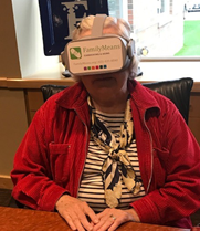 Caregiver with a virtual headset on